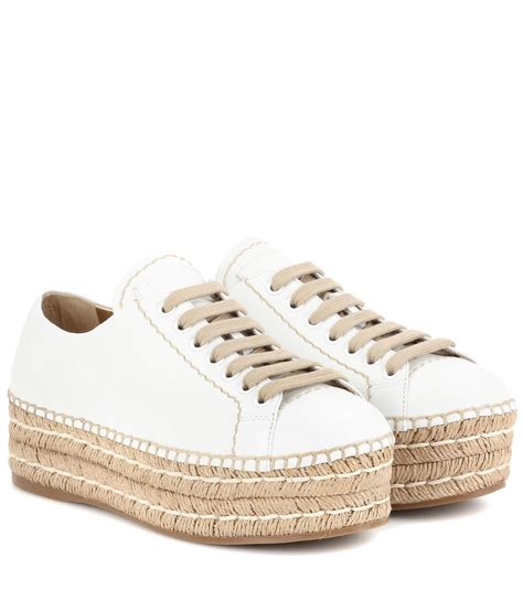 Prada white platform sneakers